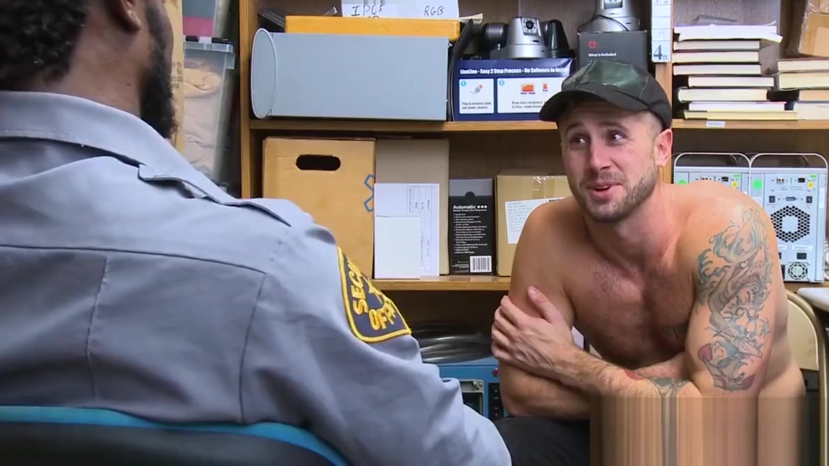 Tattooed hunk riding officers massive black dick