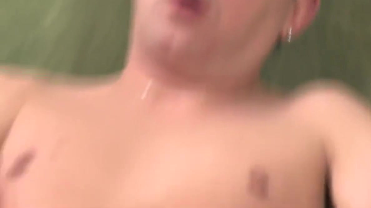 Brunette guy next door has a wank on a green sofa