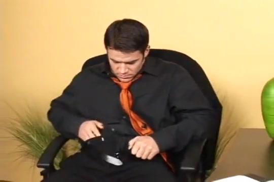 Chris fucks himself with a dildo in the office