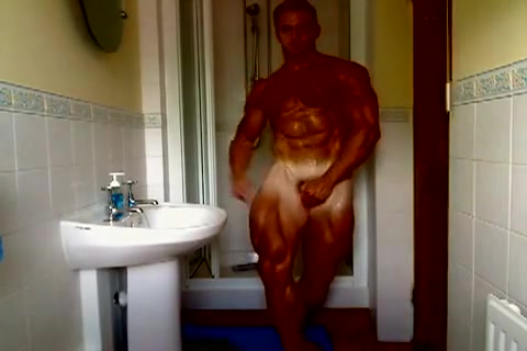 Bodybuilder showing off shower naked