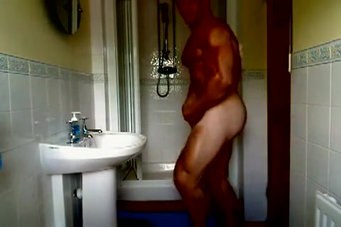 Bodybuilder showing off shower naked