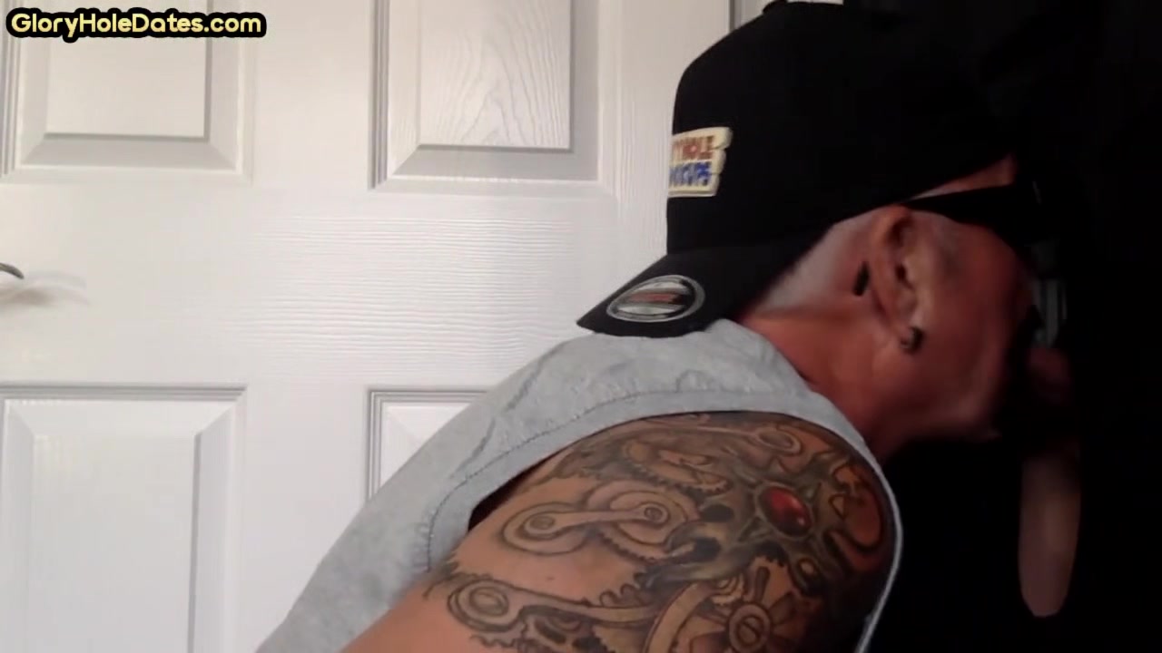 Tattooed BJ DILF sucks gloryhole penis with his jizzed mouth