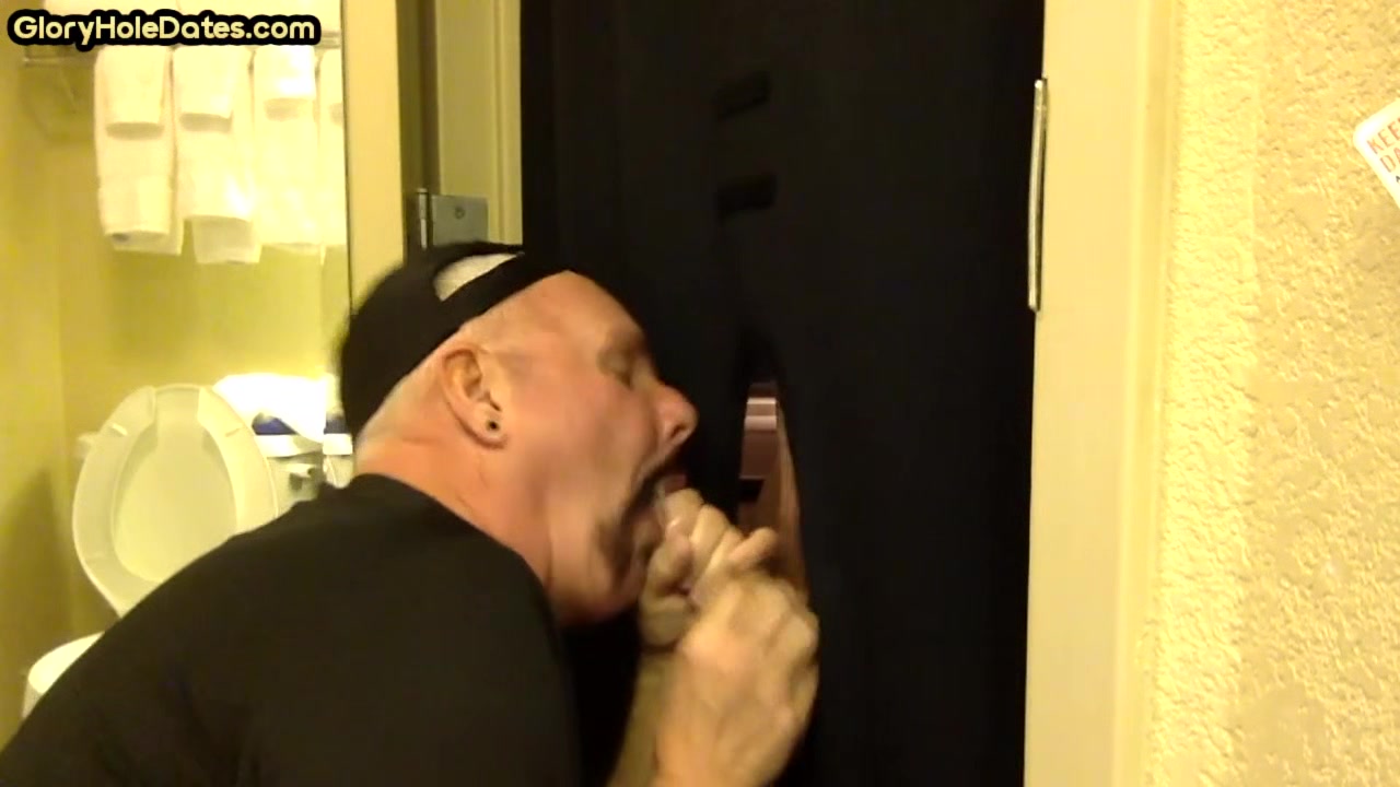 Gloryhole amateur DILF sucks and wanks BFs penis at home