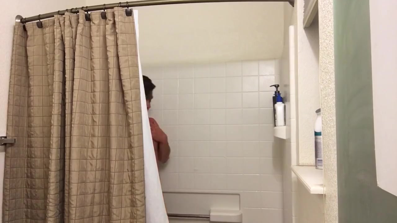 Taking a shower and playing with my cock