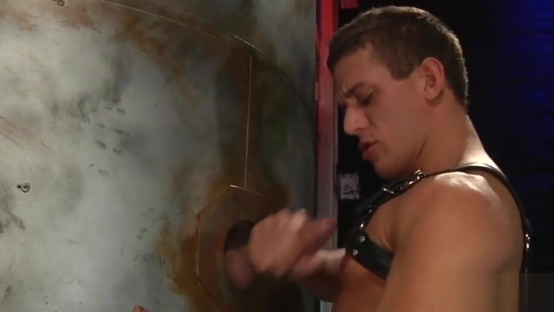 Lusty guy sucks a dick through a glory hole