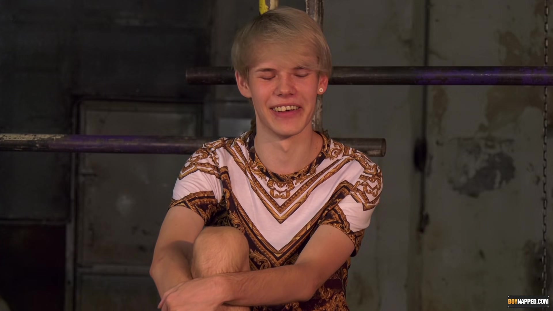 Bondage enthusiast Sean Taylor stroking waxed twink cock