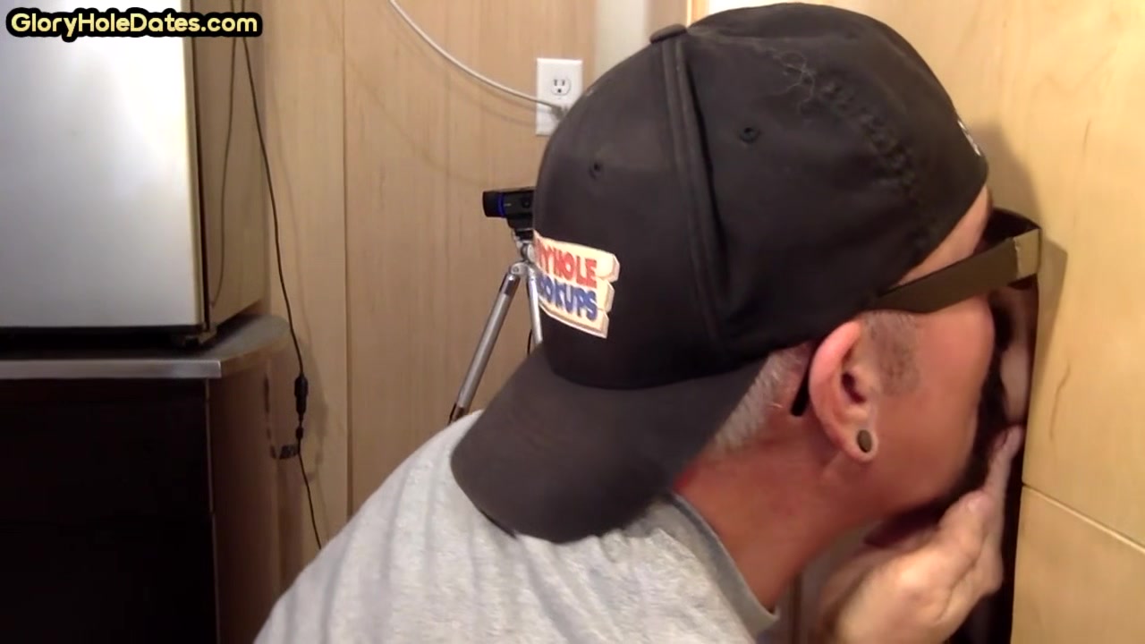 Gray DILF sucks and tugs gloryhole dick until spermed