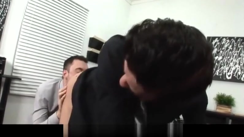 Horny gay business man gives blowjob at the office