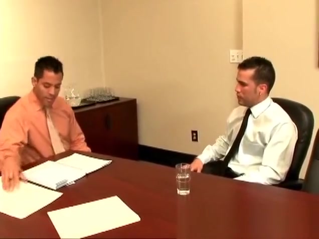 Two hunks making out in the office