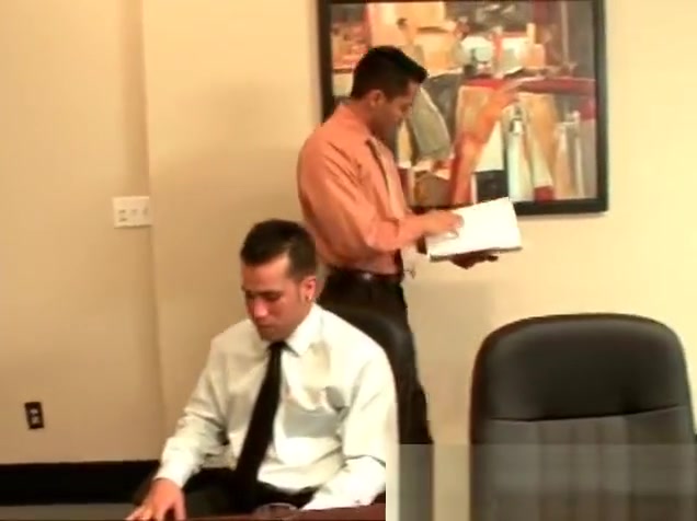 Two hunks making out in the office