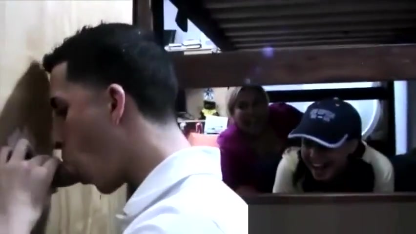College guy sucks at the gloryhole