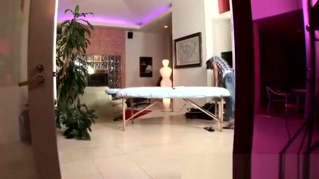 Soccer player undresses for a massage