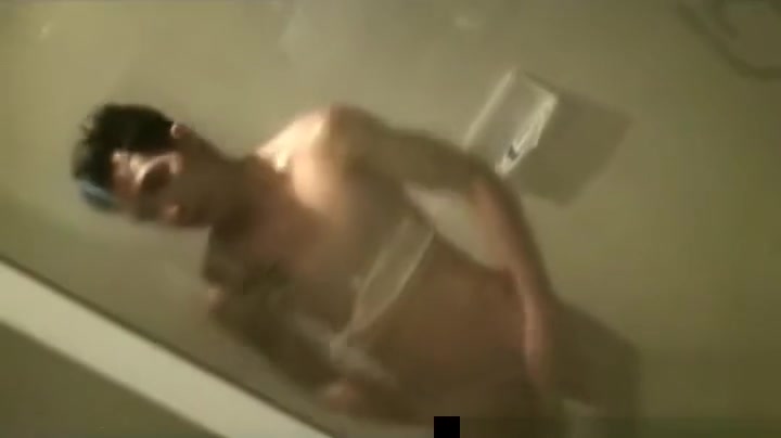 Asian guys having fun under shower
