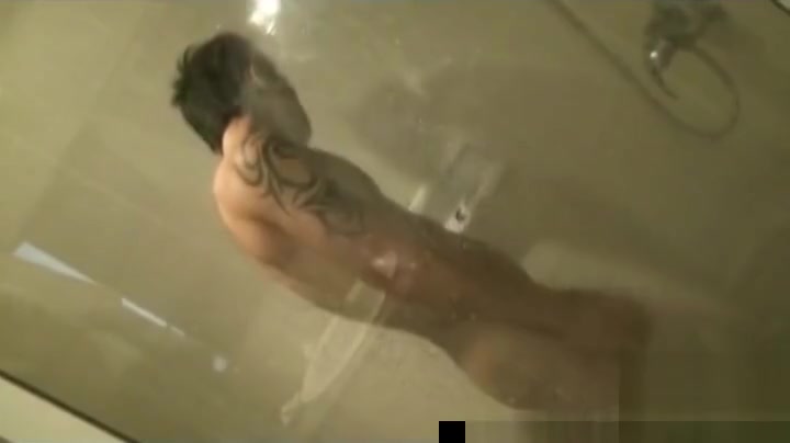 Asian guys having fun under shower