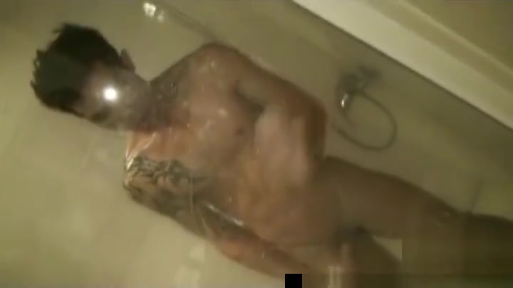 Asian guys having fun under shower