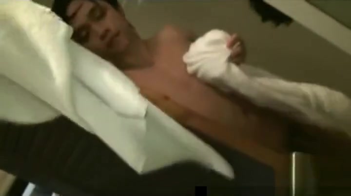 Asian guys having fun under shower