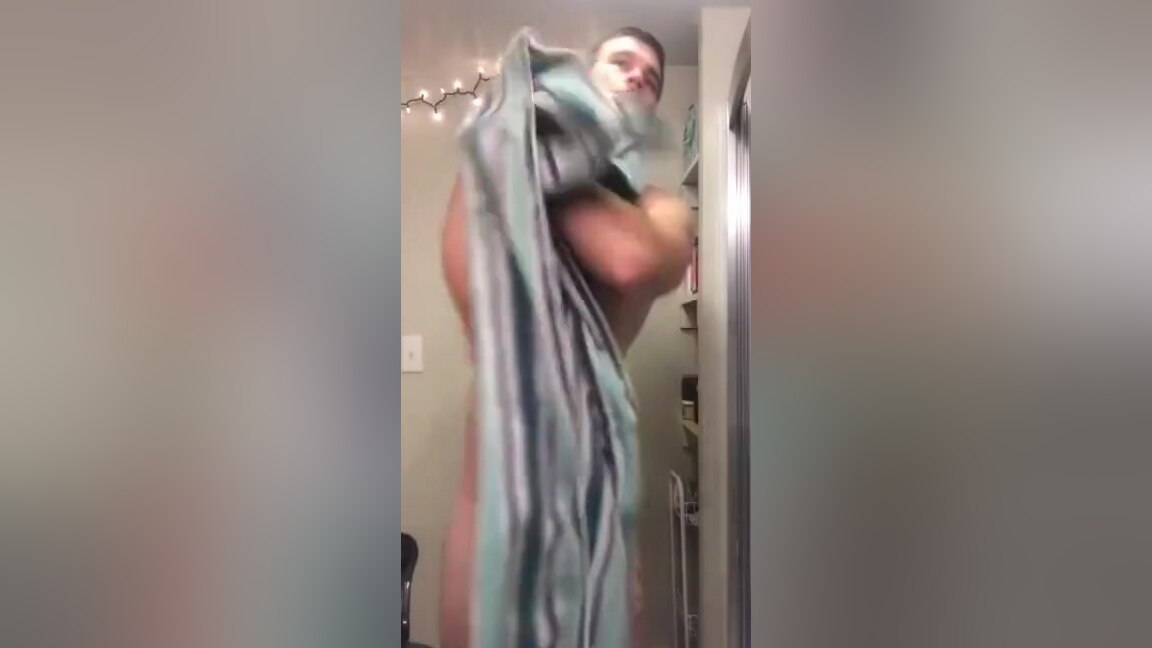 cute hunk taking a shower