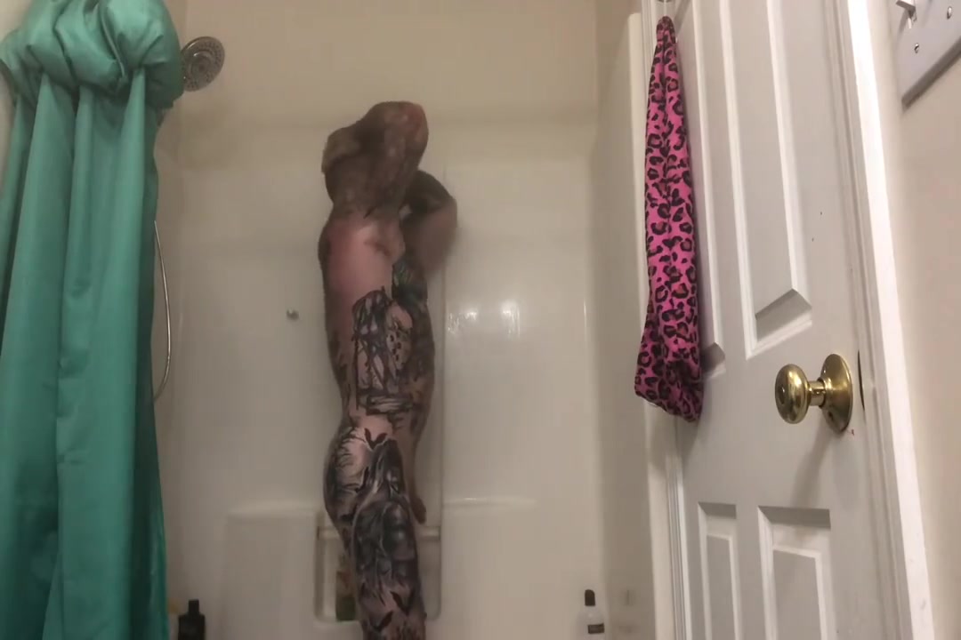 tattooed muscle stud takes a shower