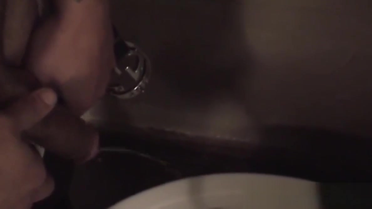 Heavily tattooed native American tugging it under the shower