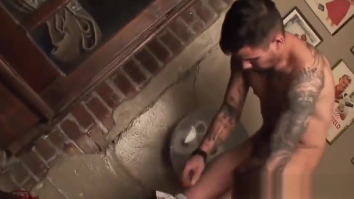 Heavily tattooed native American tugging it under the shower