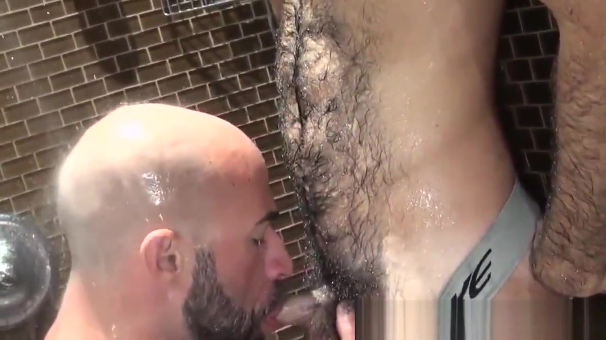 Mature bear barebacks cub in shower