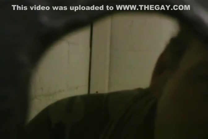 Thin gay white guy sucking off black cocks at a gloryhole