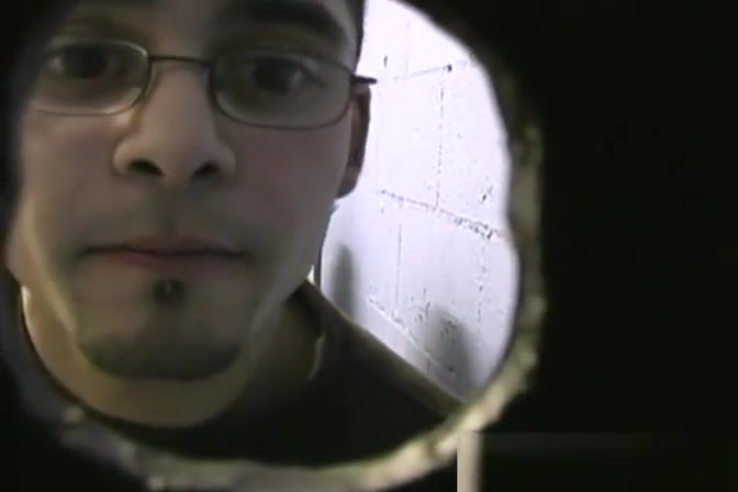 Thin gay white guy sucking off black cocks at a gloryhole