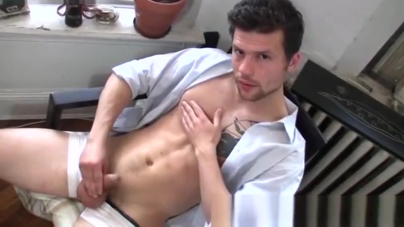 Handsome guy jerking it in the office