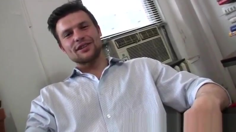 Handsome guy jerking it in the office