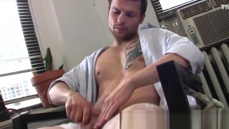 Handsome guy jerking it in the office