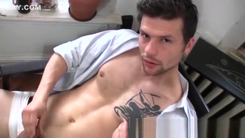 Handsome guy jerking it in the office