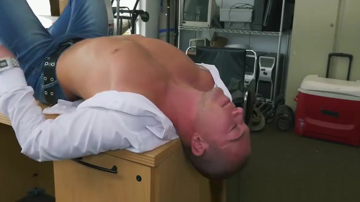 White hunk gets rammed in an office by a huge black cock
