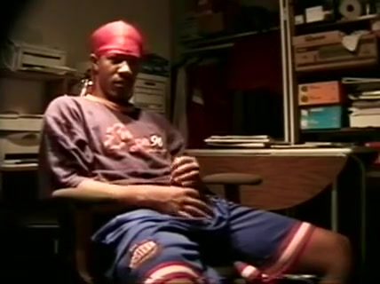 Black male hustler jerking off dick