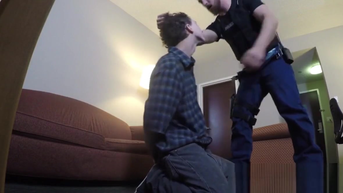 Masculine police officer pounding young perp with no mercy