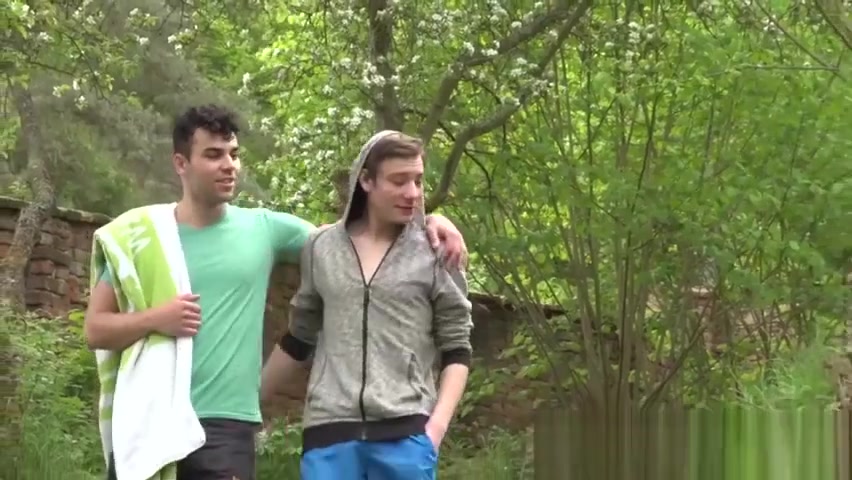Young guys have an outdoor massage and blow each other
