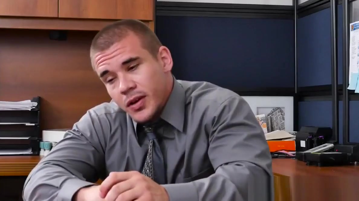 Muscular stud pounds bloke on office desk