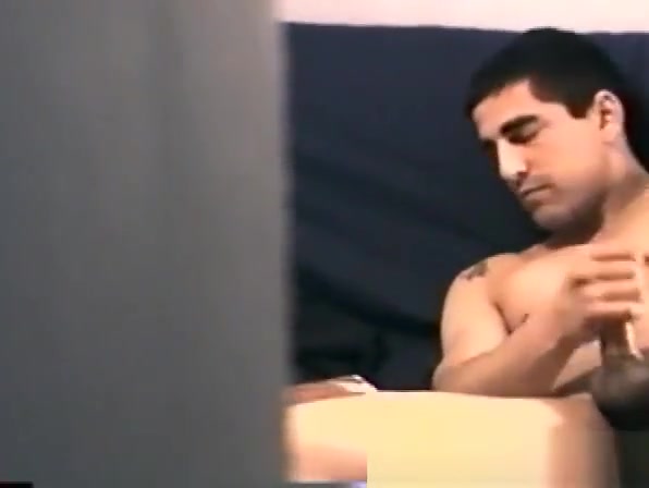 Zack unzips his pants and starts to massage his cock