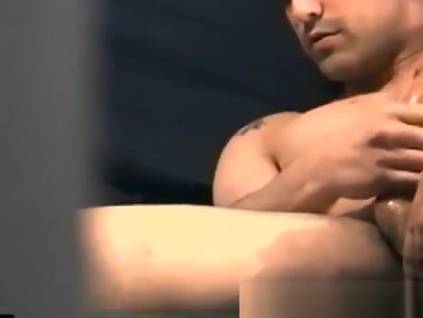 Zack unzips his pants and starts to massage his cock