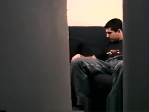 Zack unzips his pants and starts to massage his cock