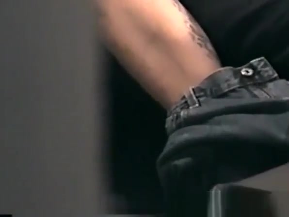Zack unzips his pants and starts to massage his cock