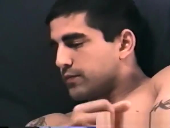 Zack unzips his pants and starts to massage his cock