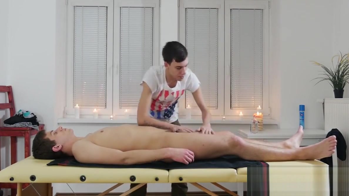 Ryan lies down on the massage table for a full body rubdown