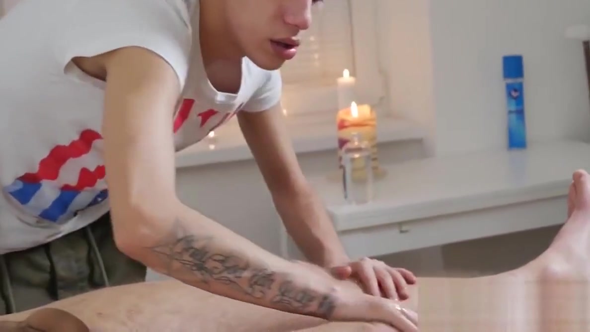Ryan lies down on the massage table for a full body rubdown