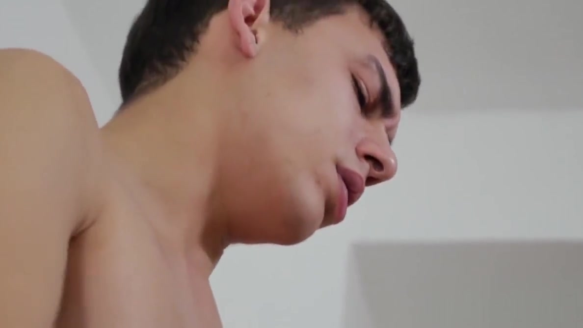 Ryan lies down on the massage table for a full body rubdown