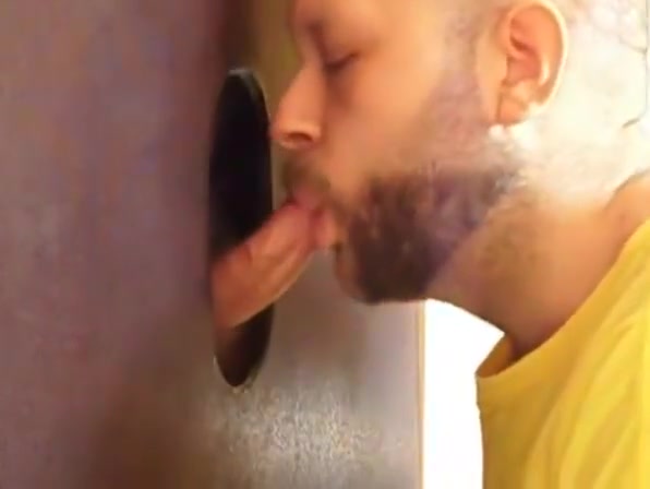 Hot sucking action at the homemade glory hole 8