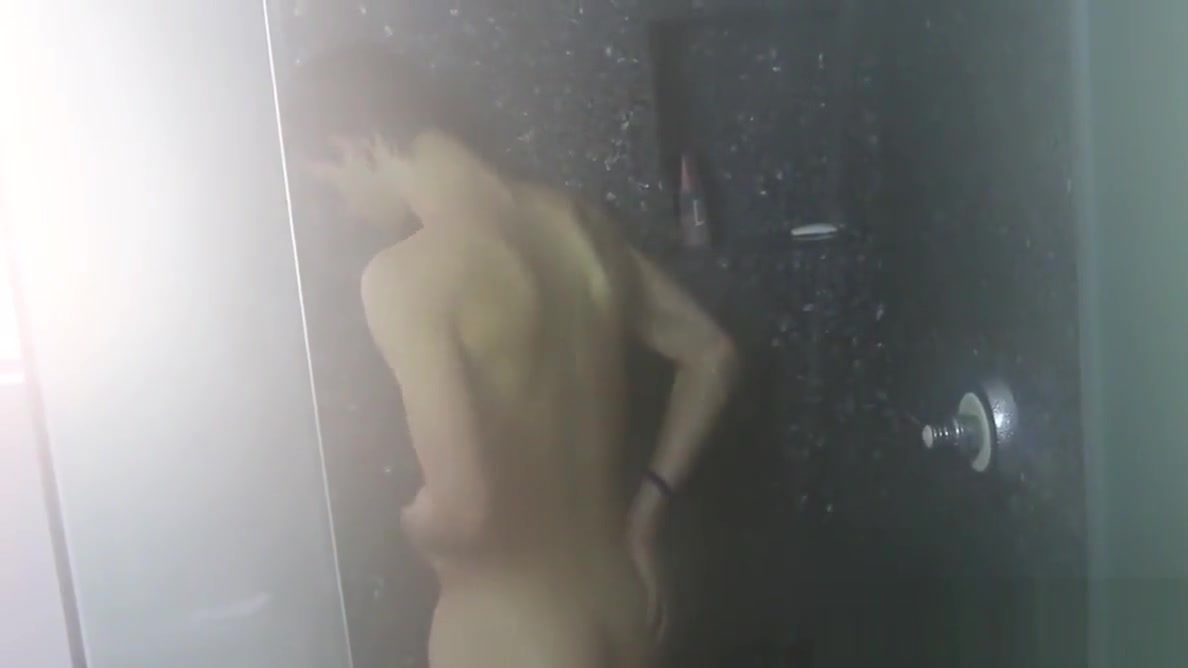 Nasty cock sucker Jasper Robinson wanks in the shower solo
