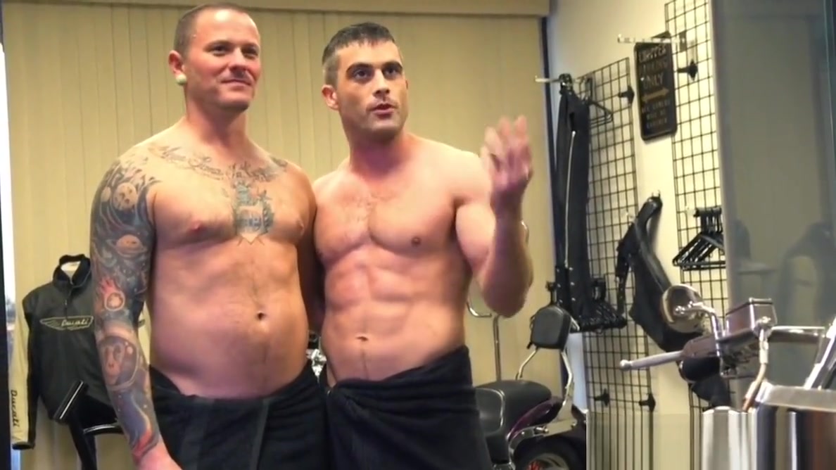BDSM hunk spanks and whips sub in his office