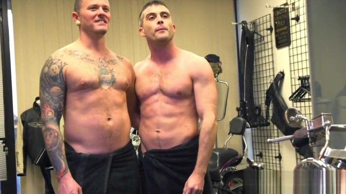 BDSM hunk spanks and whips sub in his office