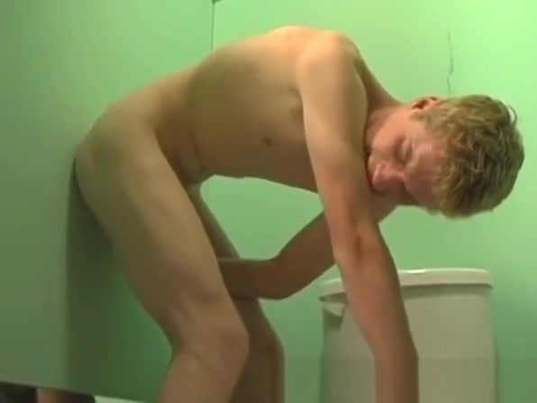 Twink blowing two cocks at the gloryhole for that jizz