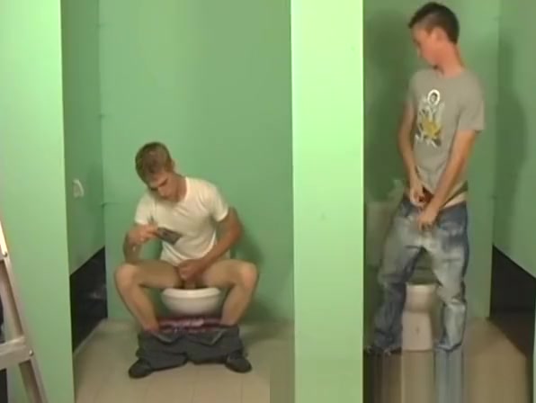 Twink blowing two cocks at the gloryhole for that jizz
